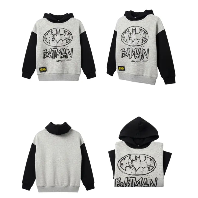 Buzo gris con letra amarilla e imagen de batman